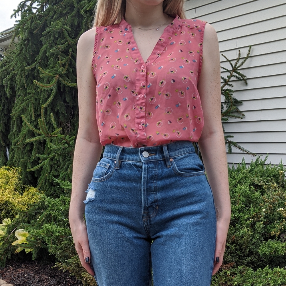 Pink patterned sleeveless blouse